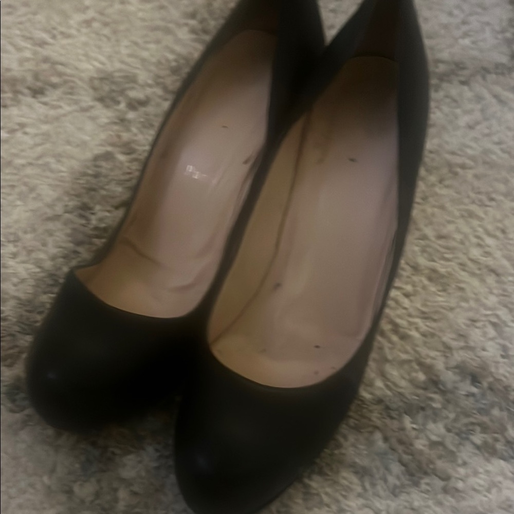 Christian Louboutin Black Heels Elegant Leather Design